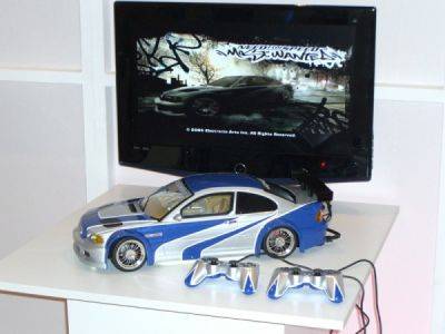 Появились изображения консоли PlayStation 2, стилизованной под легендарную BMW из NFS: Most Wanted - playground.ru