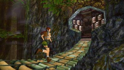 Лариса Крофт - Вышел третий крупный патч для Tomb Raider I-III Remastered - Aspyr вернула эротические плакаты с Ларой Крофт в игру - playground.ru