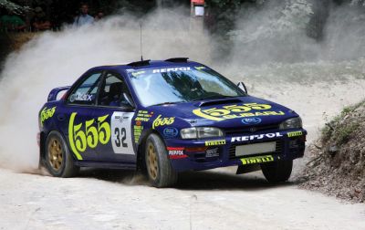 Автопарк Assetto Corsa Rally расширится за счет раллийных легенд 90-х от Peugeot и Subaru - playground.ru
